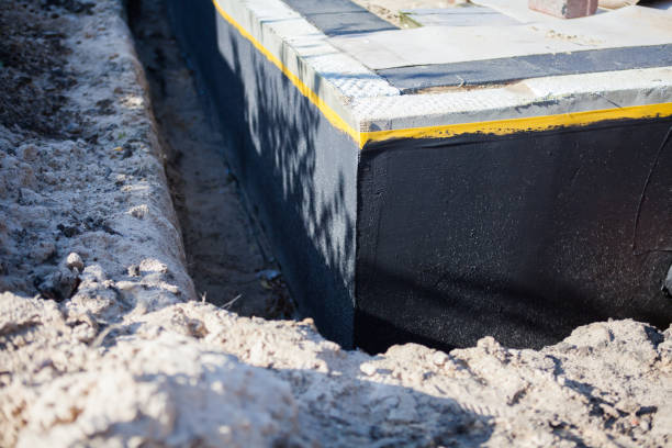 Professional Waterproofing technician working in Gresham, WI
